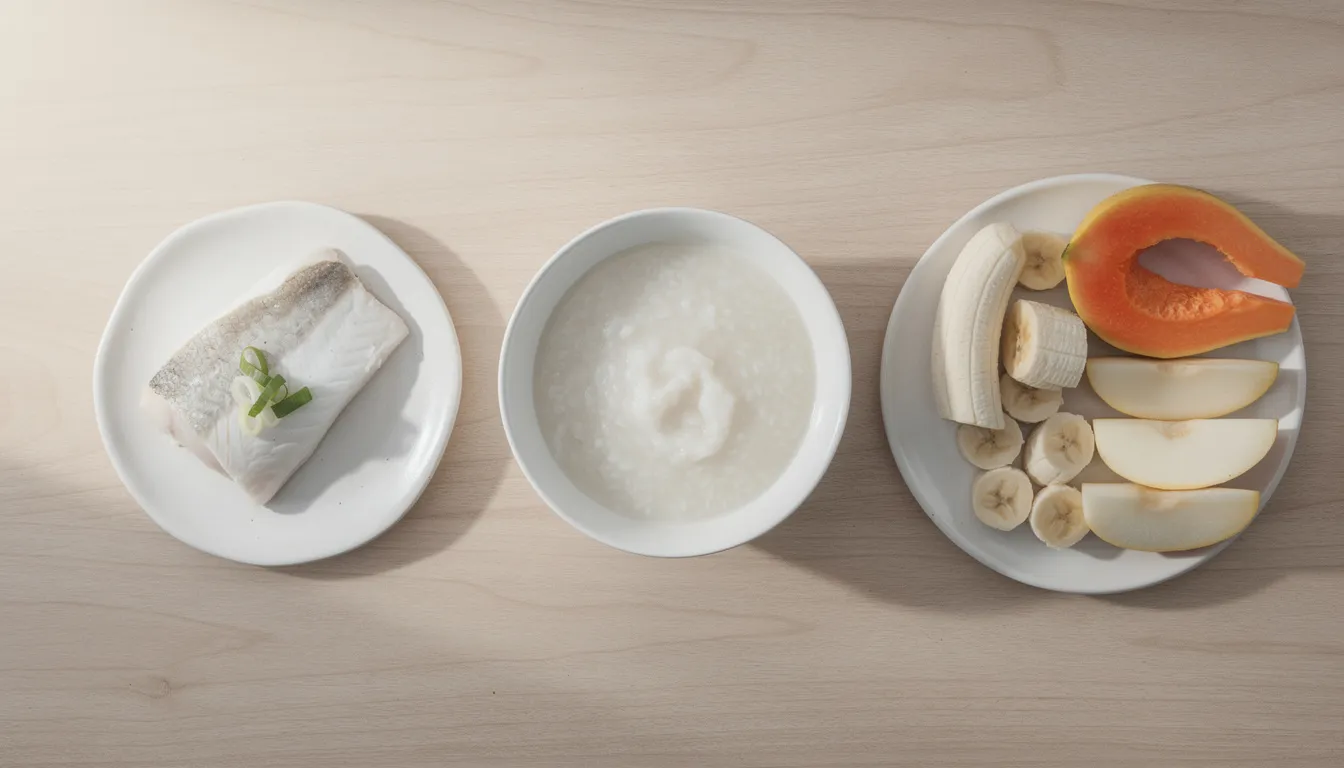 The image features a table set with an array of stomach-friendly foods, including steamed fish, rice porridge, and fresh fruits, ideal for those experiencing heartburn symptoms during pregnancy. These gentle options can help prevent stomach acid and provide relief from the burning sensation often associated with acid reflux.